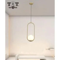 Lampadario A Sospensione Ovale Metallo Con Sfera In Vetro Attacco E27 Oro Design Moderno Minimal